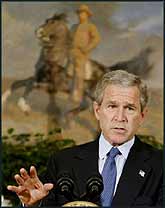 National hero, cowboy politician, or international tyrant? George Bush has big plans for the Wild East.