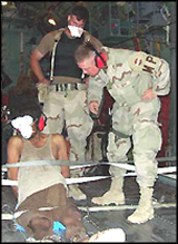 Bringing justice home from Afghanistan, 2001. One authenticated record of the USA's brutal treatment of prisoners.