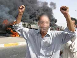 A resident of Baghdad (disguised) jumps for joy as another strike is made by resistance fighters against the USA occupiers.