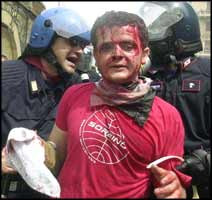 This is just one instance of many acts of police brutality that took place at the Genoa demonstrations against capitalist globalisation in 2001.